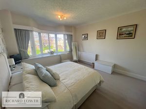 Bedroom One- click for photo gallery